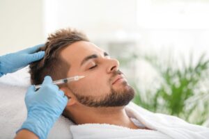 Man relaxing while receiving BOTOX injections